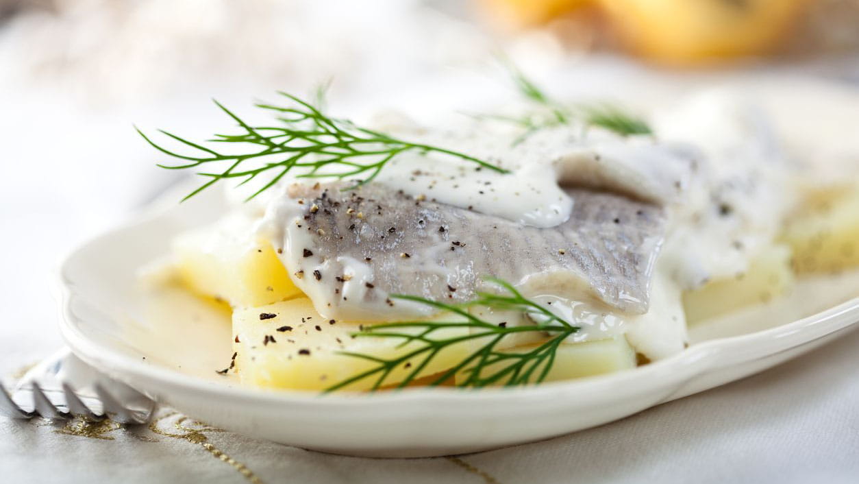 Śledzie w śmietanie - przepis Kamis